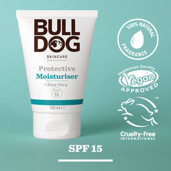 A tube of Protective Moisturiser with Aloe Vera SPF 15 stands against a teal background, featuring badges for natural ingredients. Its vegan approved, cruelty-free, and gentle on skin.