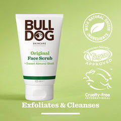 A tube of Original Face Scrub for men is shown on a green background, labeled vegan, cruelty-free, and made with natural-origin ingredients. Text underneath reads: “Exfoliation & Cleansing.” Contains sweet almond shell.